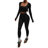 European and American style sports yoga outfit for women, featuring a cut-out back with lacing and thumb holes, long-sleeved top, and peach-butt fitness leggings