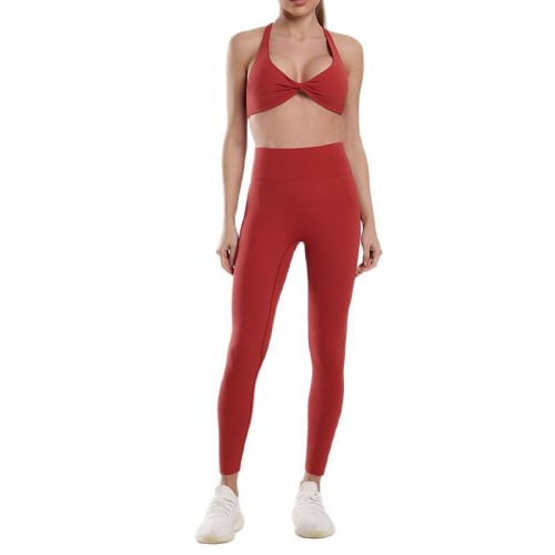 Nude-feel cross-strap backless sports bra and long pants set for women, two-piece yoga outfit with peach butt effect and sexy leggings