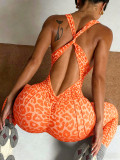 Leopard print one-piece yoga outfit for women, suitable for fitness, sports, and casual wear, with built-in chest pads