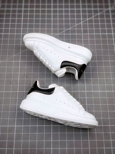 Alexander McQueen/亚历山大麦昆黑尾亮皮