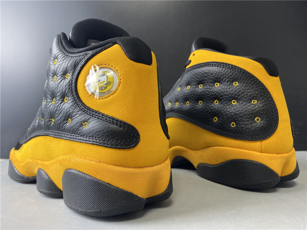 jordan black and yellow 13