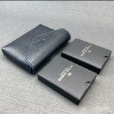 Roger Dubuis leather handbag and commemorative poker