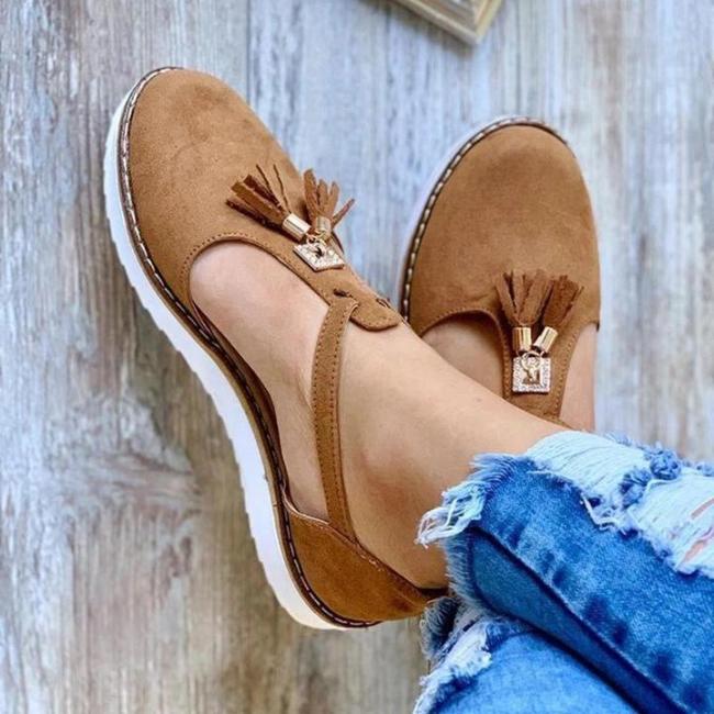 strappy sandals with tassels