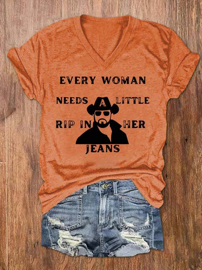 Women's EVERY WOMAN NEEDS LITTLE RIP IN HER JEANS  V-Neck Tee