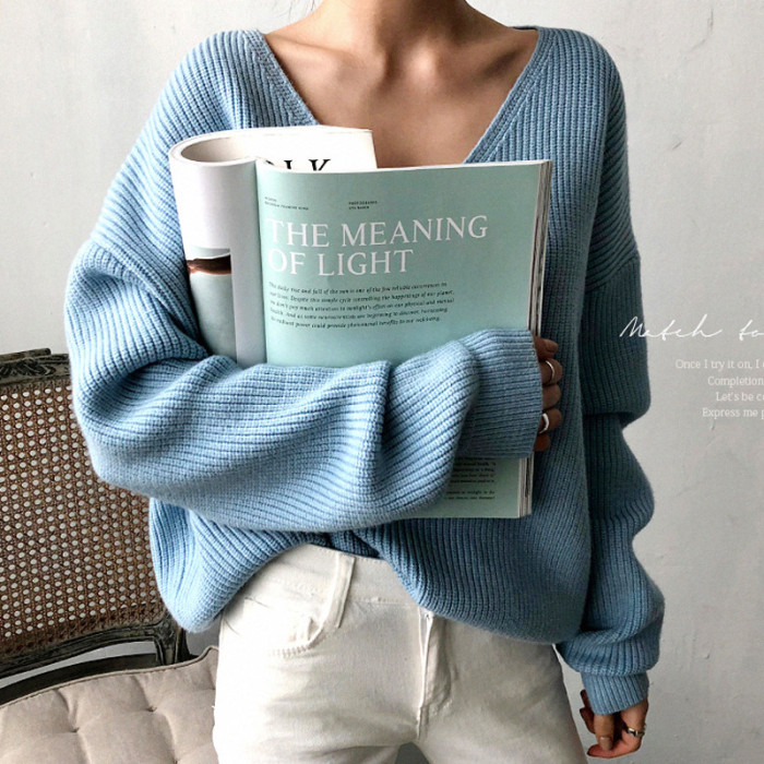 Sweater With Irregular Hem In Solid Color