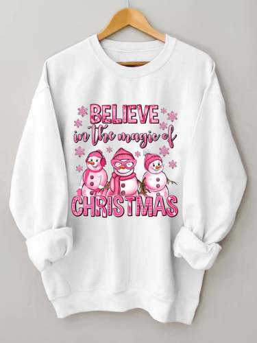 Women's Believe In The Magic Of Christmas pink snowman print sweatshirt