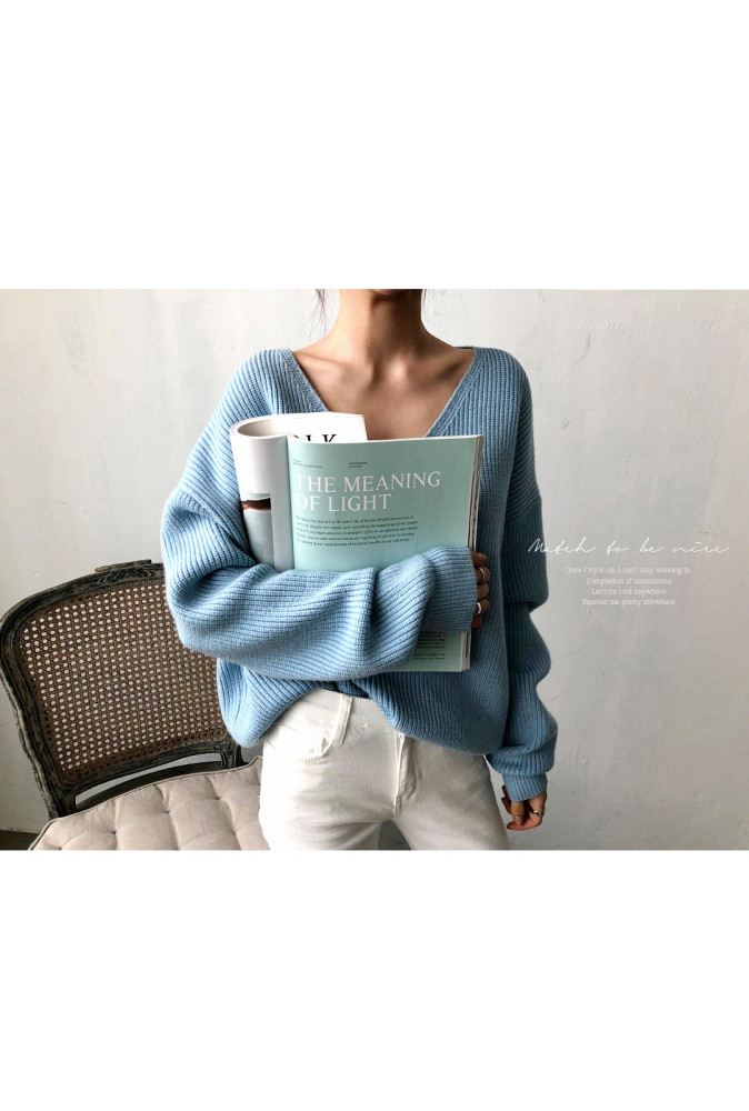 Sweater With Irregular Hem In Solid Color