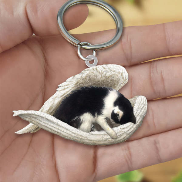 Black and white Cat Sleeping Angel Acrylic Keychain
