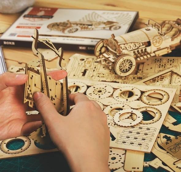 Wooden mechanical model puzzle