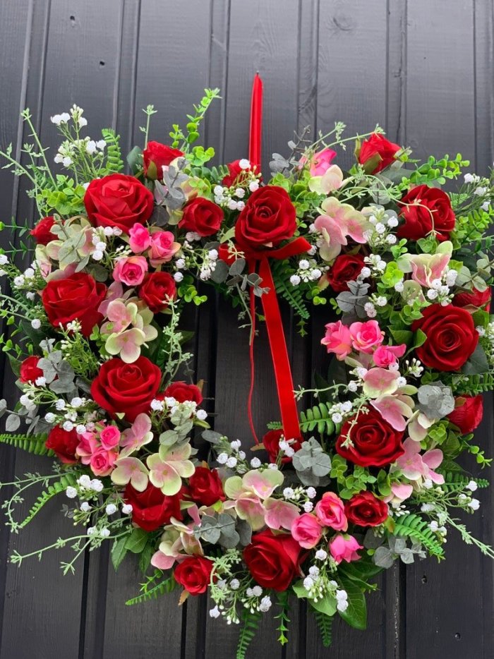 Valentines roses heart wreath design in red, pink and white.