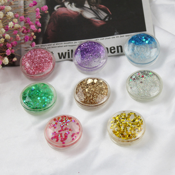 Universal cell phone finger holder transparent quicksand for iphone samsung xiaom bracket grip expanding stand socket Soporte de telefonos celulares