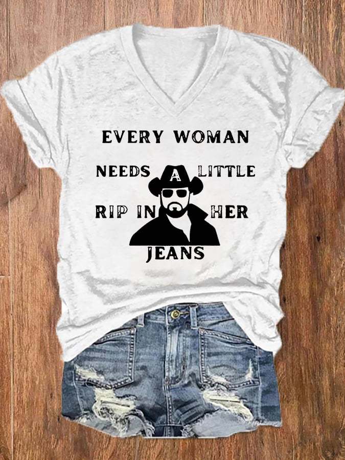 Women's EVERY WOMAN NEEDS LITTLE RIP IN HER JEANS  V-Neck Tee