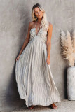 Pocketed Printed Halter Backless Maxi Dress