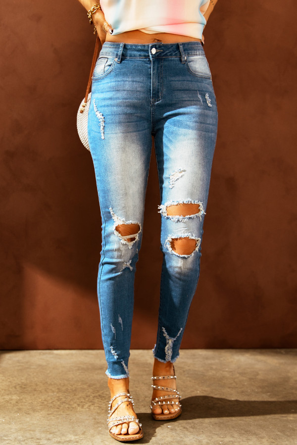 Faded Mid High Rise Jeans with Holes