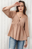 Orange Notched V-Neck Smocked Back Peplum Blouse