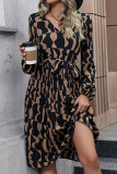 Brown Printed V Neck Pleated Dress With Sash