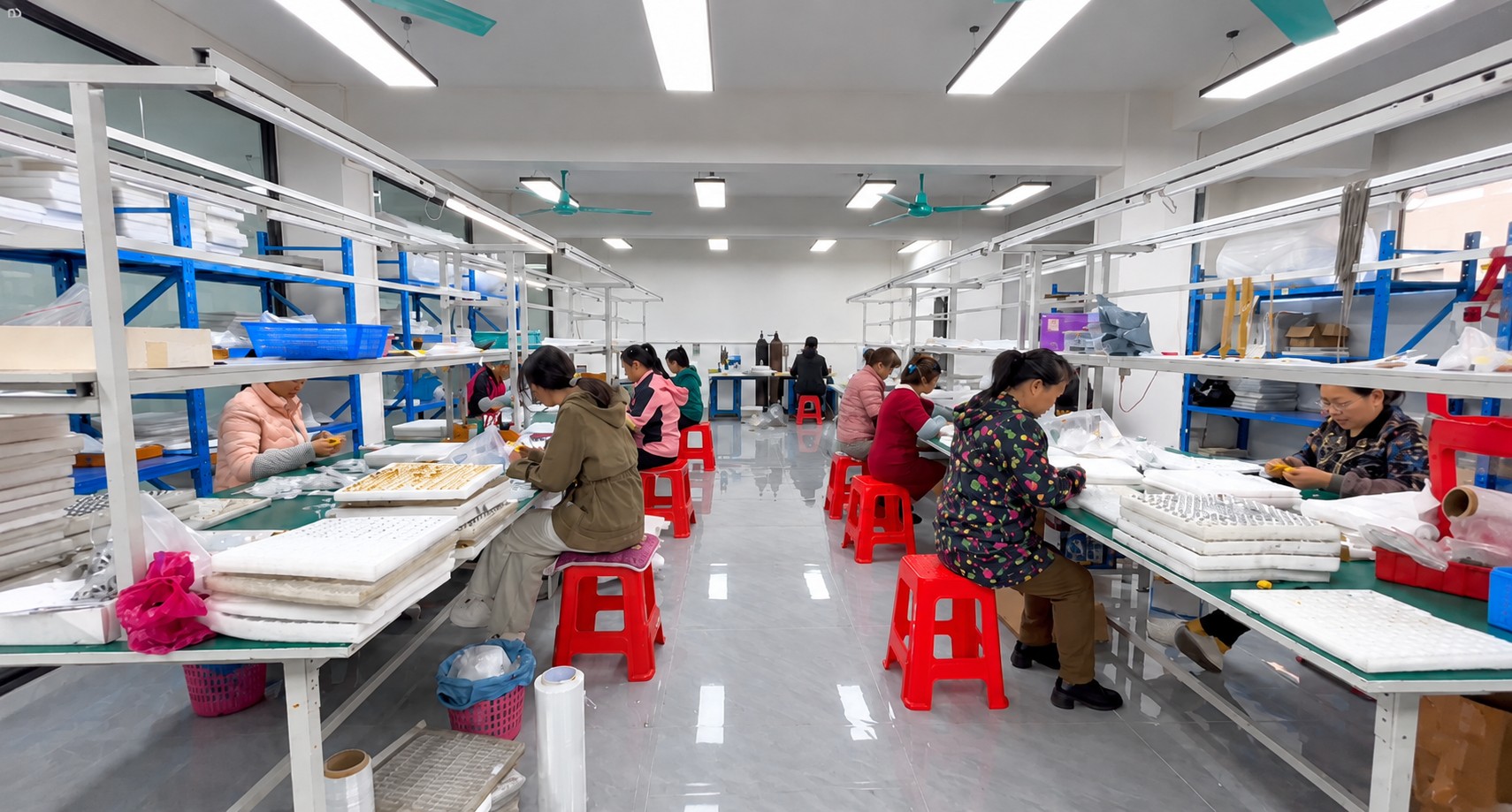 Jewelry assembly workshop with workers at Touchlove Jewelry factory in Dongguan, China