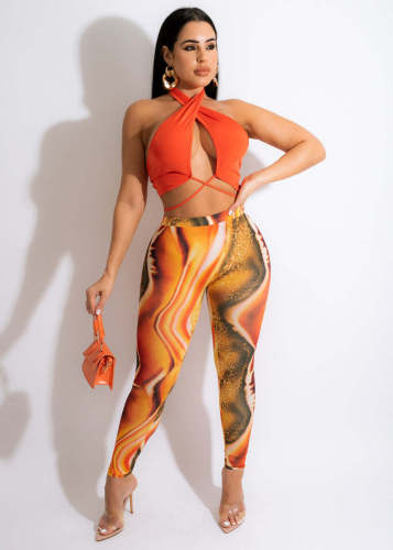 Sexy halterneck solid color top + printed trousers two-piece set