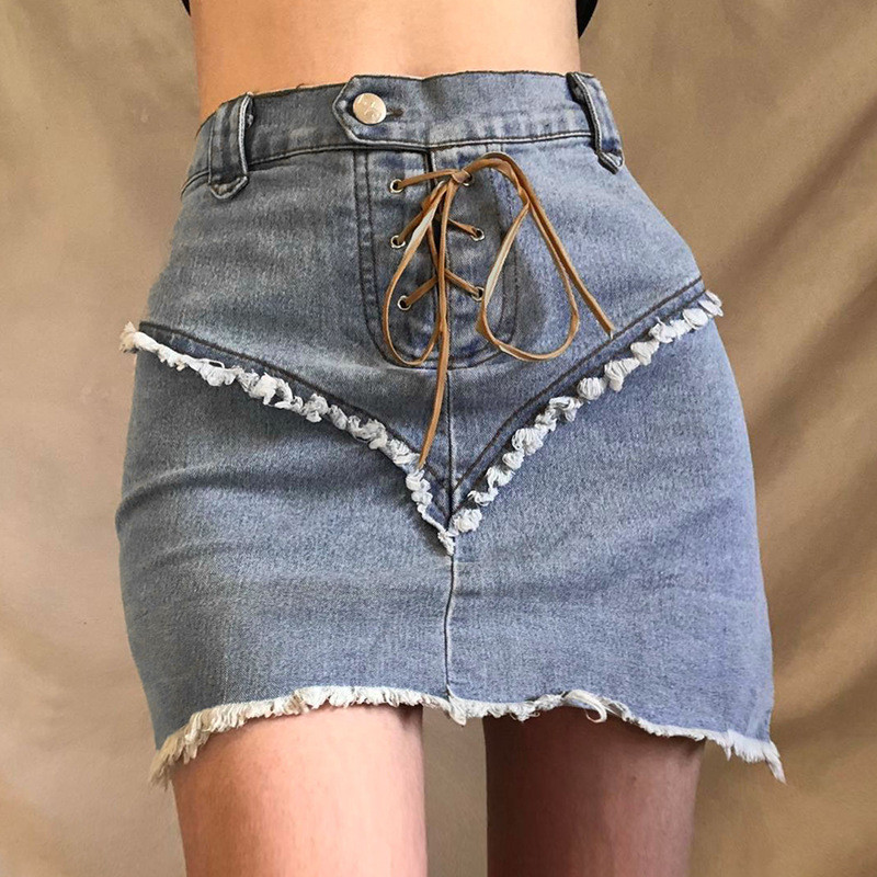 Fashionable and sexy stitching brushed eyelet lace-up denim skirt