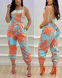 suspender open-back bow print high-waisted jumpsuit