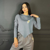 Fashion women's autumn and winter new round neck cross print long sleeve bevel sports sweater