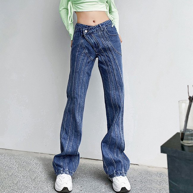 Deconstructed slim-fit jeans with multi-line split patchwork design