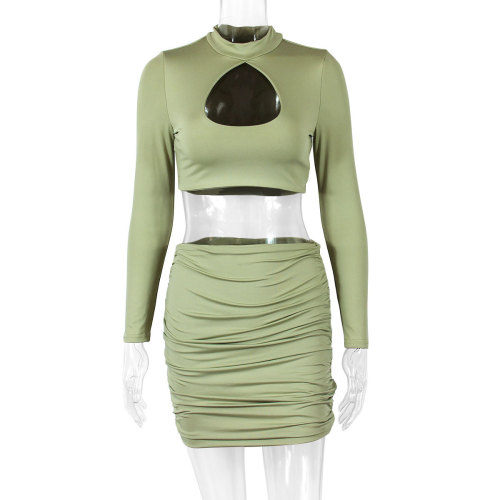 Autumn and winter sexy hollow out long sleeved hip wrap skirt pleated open navel two-piece set