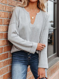 Solid V-neck sweater with reverse European and American curling edge