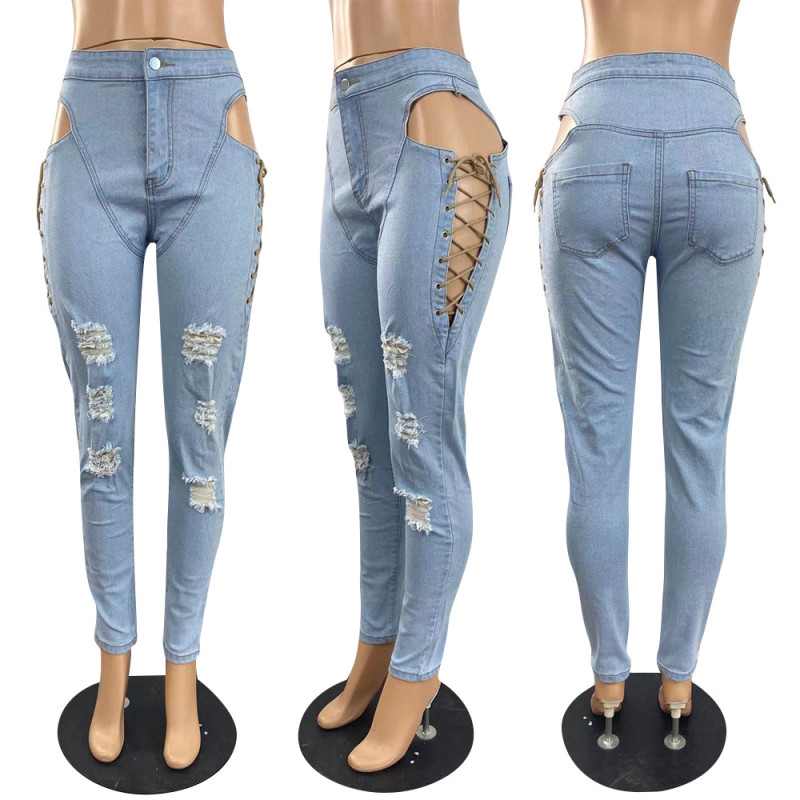 Worn jeans with cornhole strap