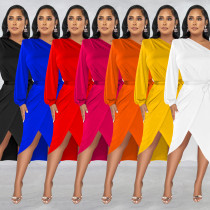 Fashion women's solid color single long sleeved diagonal long skirt dress