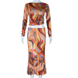 Fashion printed round neck long sleeved navel exposed top with buttocks wrapped skirt set