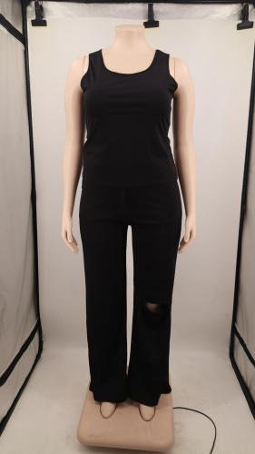 Oversized women's two-piece torn wide leg pants set