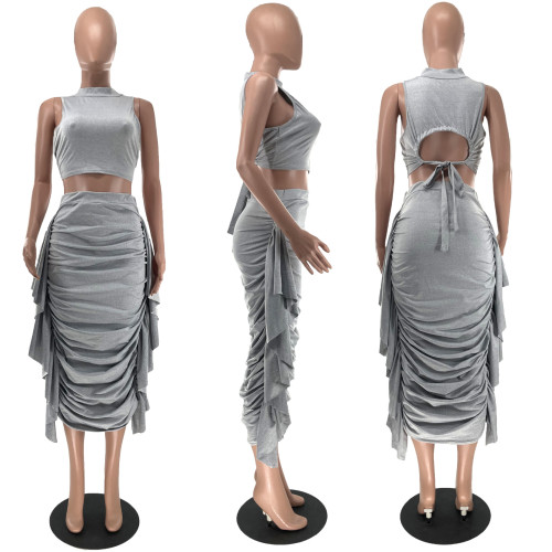 Women's solid color high waisted ruffled edge with exposed navel tight vest skirt set
