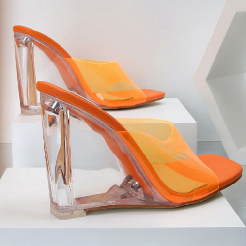 Wearing thick heeled transparent PVC wide band sandals and slippers on the outside with high heels