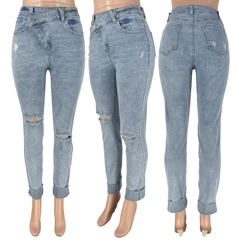 Casual women's personalized torn hole diagonal buckle elastic jeans