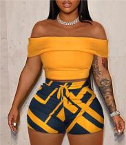 Off shoulder top with contrasting printed short pants set