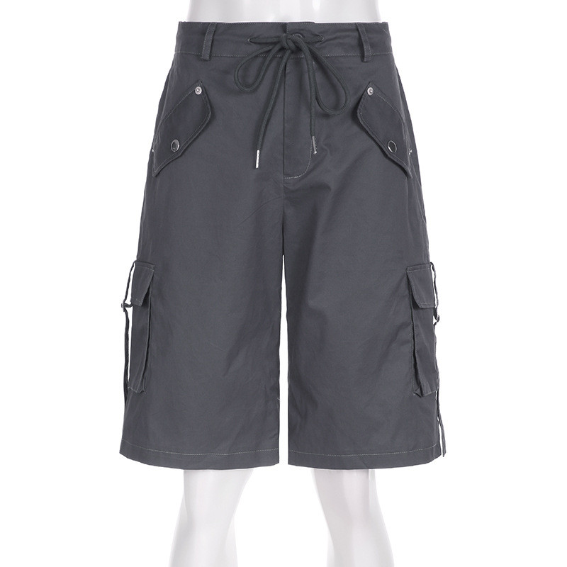 Workwear style with multiple pockets, cuffed and tied up half length pants, loose and casual low waisted straight woven shorts