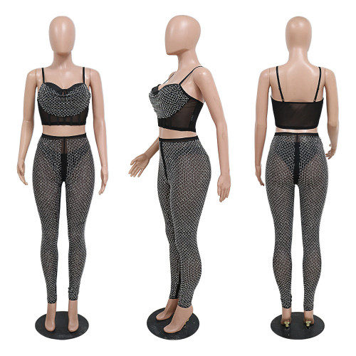 Sleeveless suspender top with slim fitting pencil pants and hot diamond set