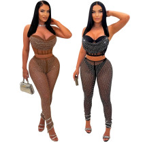 Sleeveless suspender top with slim fitting pencil pants and hot diamond set