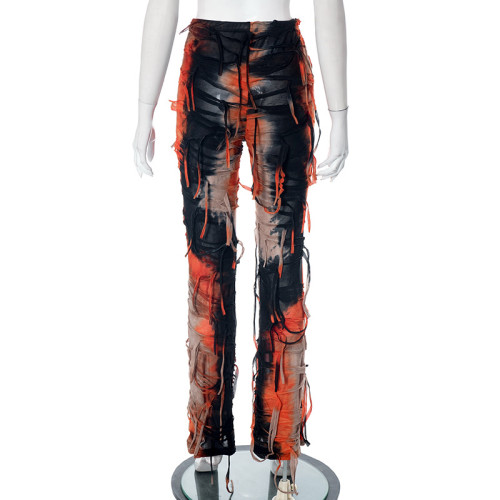 Fashionable tassels with holes and tight casual pants
