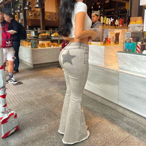 Low waisted, buttocks lifted, belly tucked, five pointed star printed bell bottoms