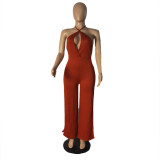 Fashionable women's jumpsuit with lace up pit leg pants and split legs