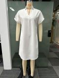 V-neck short sleeved medium length shirt with a flip collar and solid color dress
