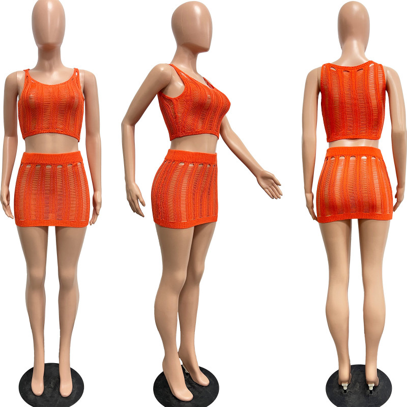 Knitted hollowed out vest and skirt two-piece set