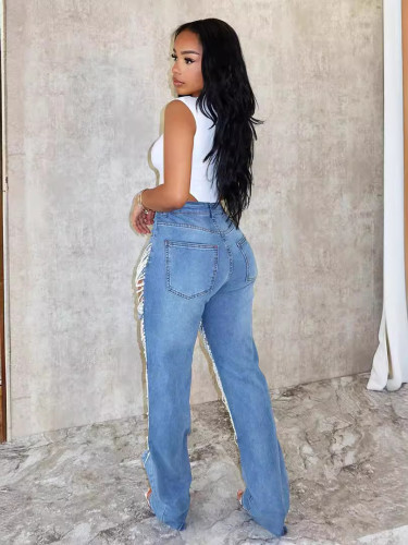 Broken pearl chain decorative jeans