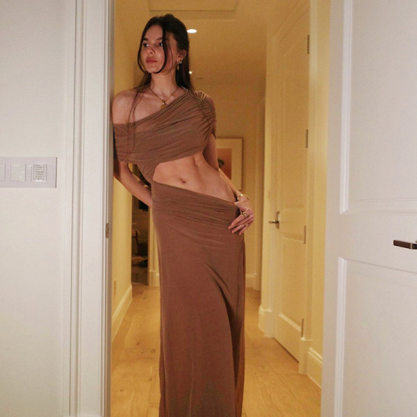 Slanted shoulder hollow out long skirt