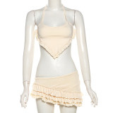 Three piece set of neck tie, irregular vest, short skirt