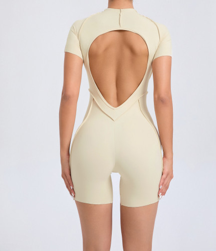 Splicing thread exposed tight fitting short sleeved hollow jumpsuit