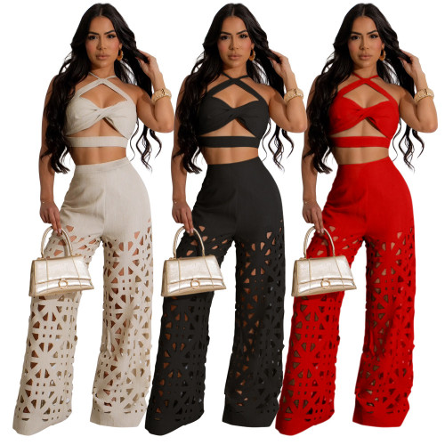 Strap top paired with hollowed out wide leg pants