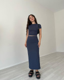 Solid color round neck short sleeved top and long skirt set